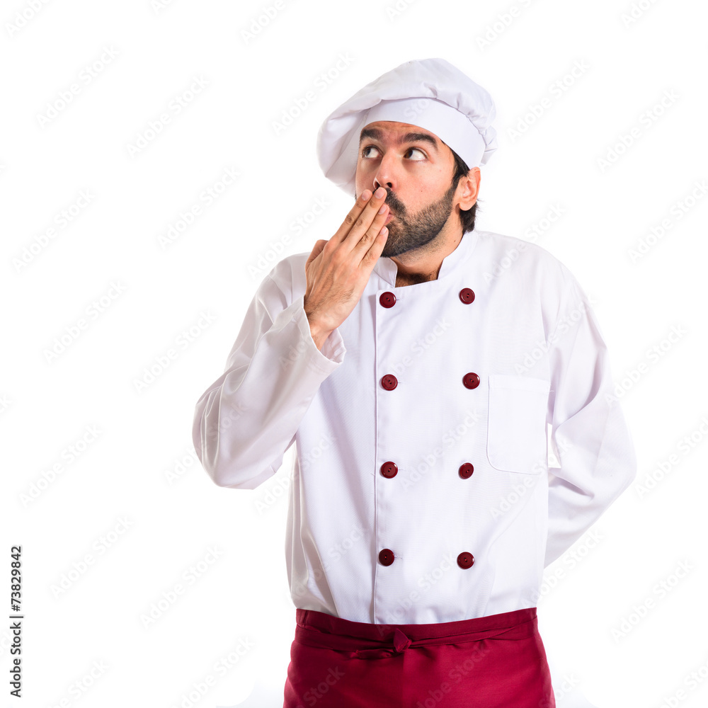 Chef doing surprise gesture over white background Chef doing surprise gesture over white background