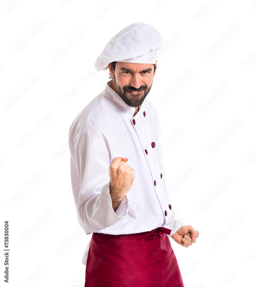 Lucky chef over isolated white background
