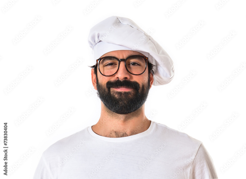 Chef smiling over white background Chef smiling over white background