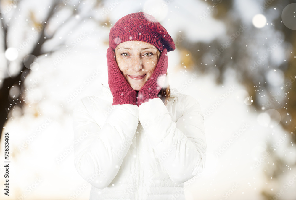 Happy woman in the snow