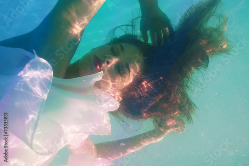 underwater girl in swimming pool