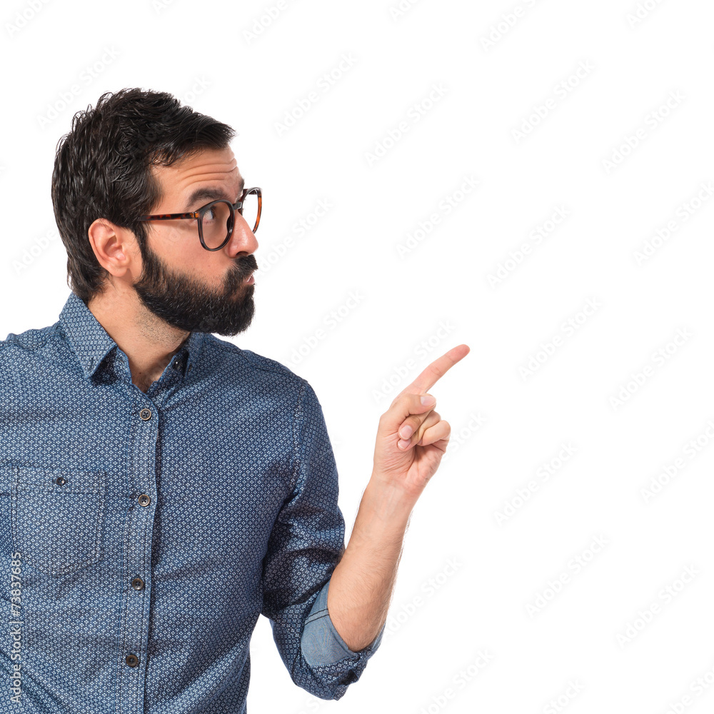 Young hipster man thinking over white background Young hipster man thinking over white background