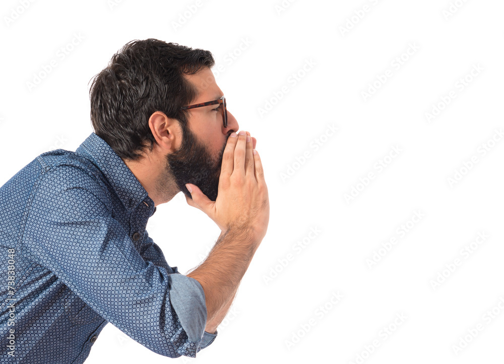 Young hipster man shouting over white background Young hipster man shouting over white background