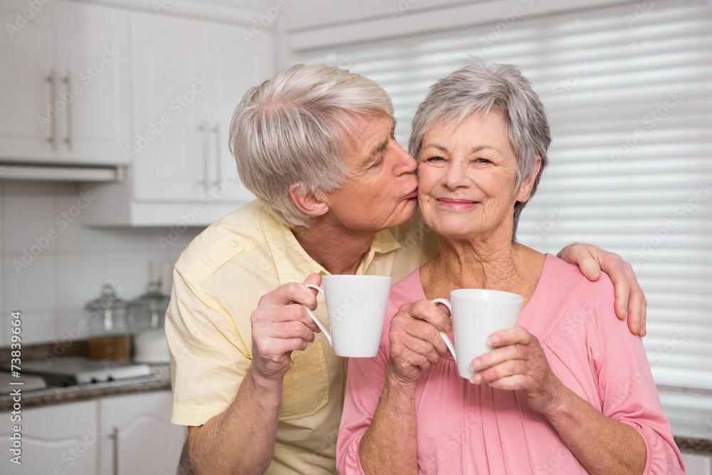 Senior couple having coffee together Senior couple having coffee together