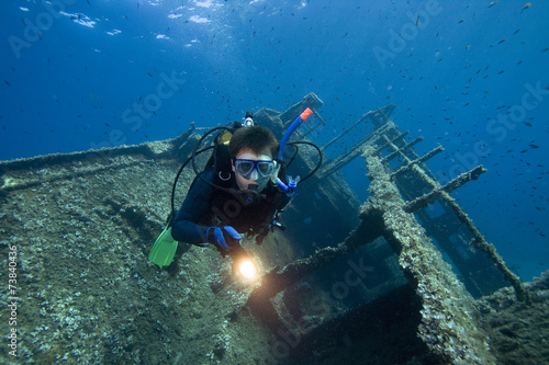 Divers exploring a wreck © frantisek hojdysz