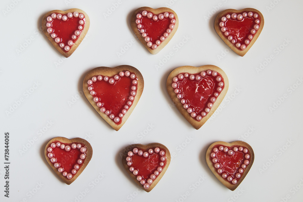Red hearts cookies on white background Red hearts cookies on white background