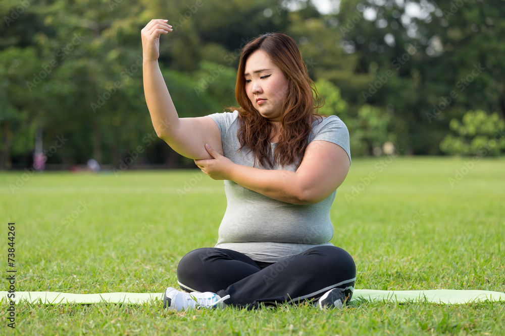 obese women is worrying about her overweight obese women is worrying about her overweight