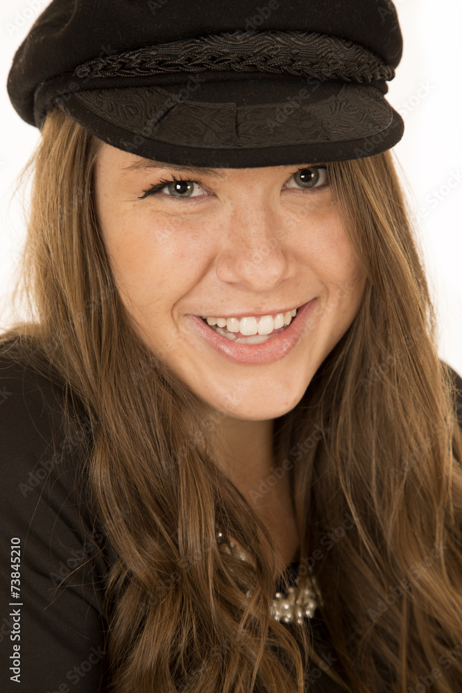 cute brunette woman wearing a black hat smiling cute brunette woman wearing a black hat smiling