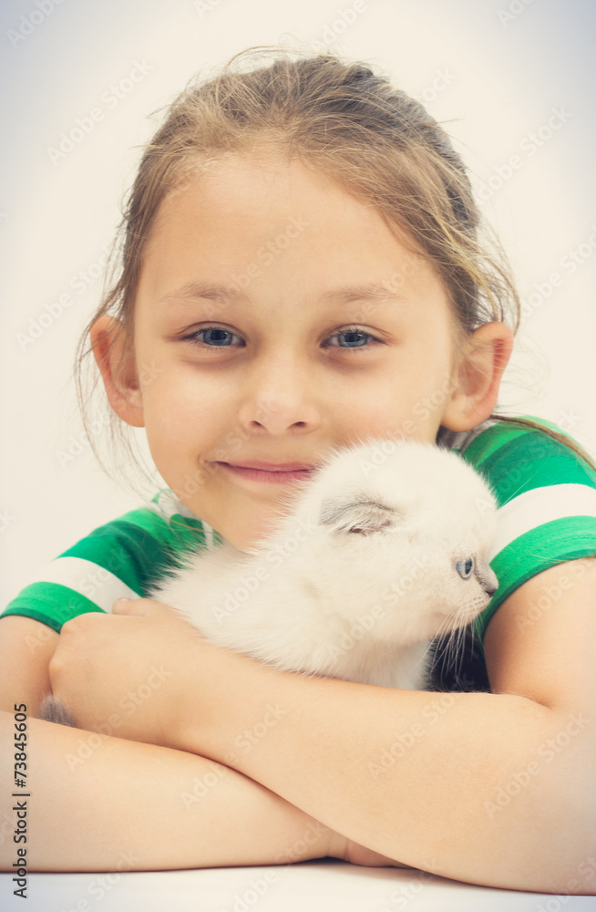 portrait of a little girl and a kitten portrait of a little girl and a kitten