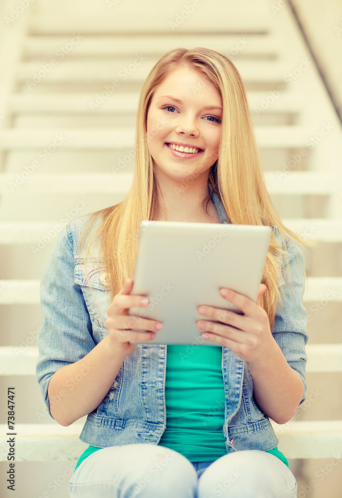 smiling female student with tablet pc computer smiling female student with tablet pc computer
