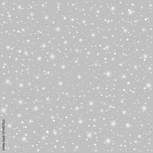 Christmas background with sparkling stars and flakes