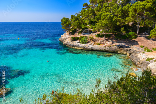 Beach with turquoise sea water  Cala Mitjaneta  Menorca island