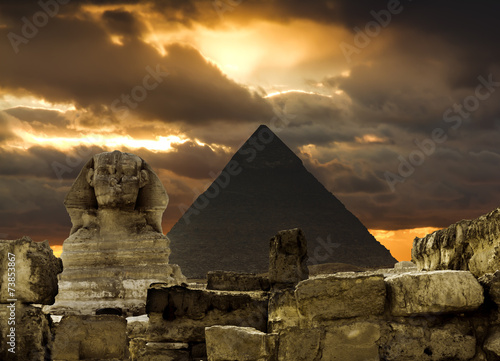 The Sphinx and the pyramid of Cheops in Giza Egipt  at sunset #73853867