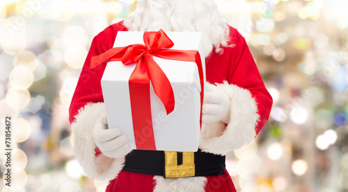 man in costume of santa claus with gift box