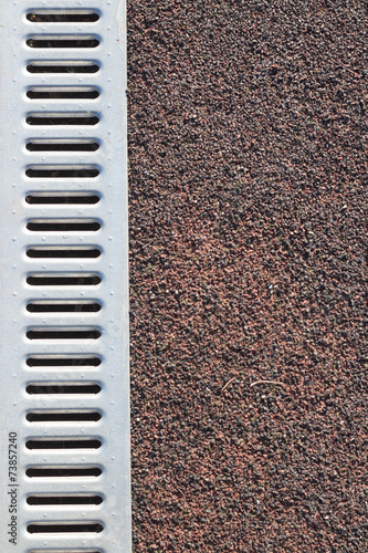 Coverage stadium with metall water drain texture