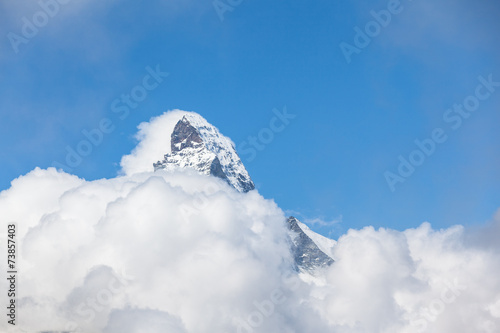 Close view of the Matrerhorn over the cloud photo