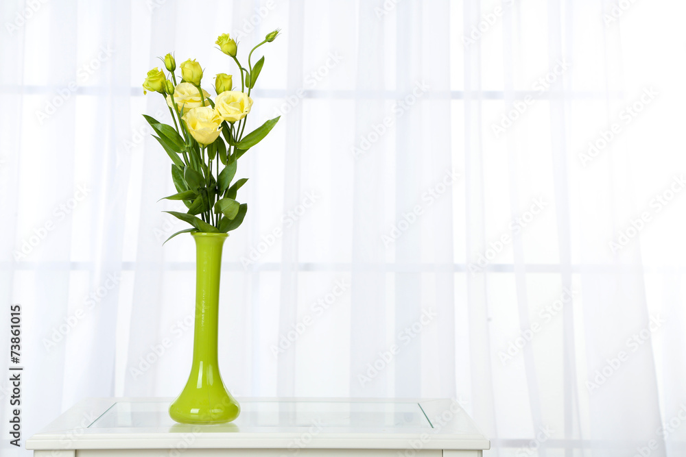 Beautiful bouquet of flowers in vase on window background Beautiful bouquet of flowers in vase on window background