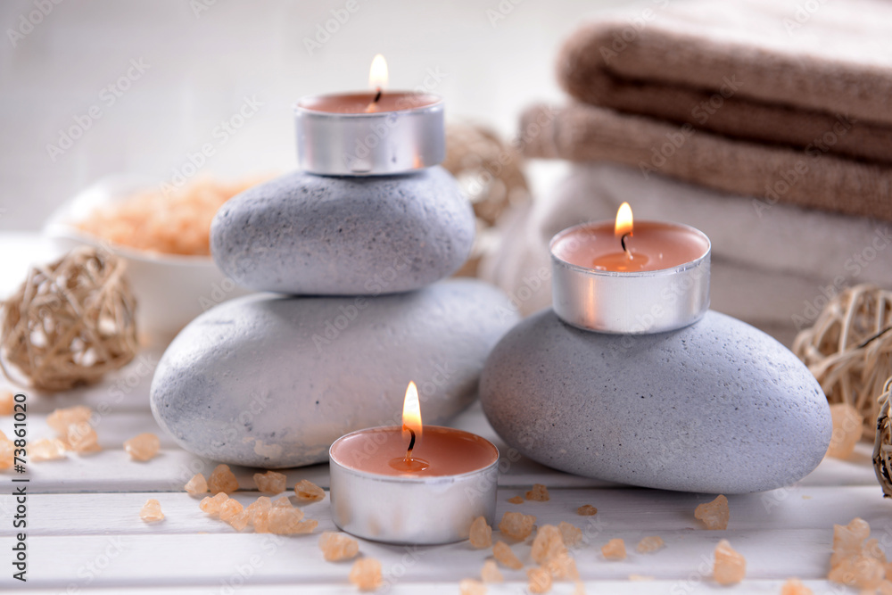 Composition of spa treatment on table on white background Composition of spa treatment on table on white background
