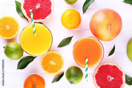 Juices and many citrus close-up