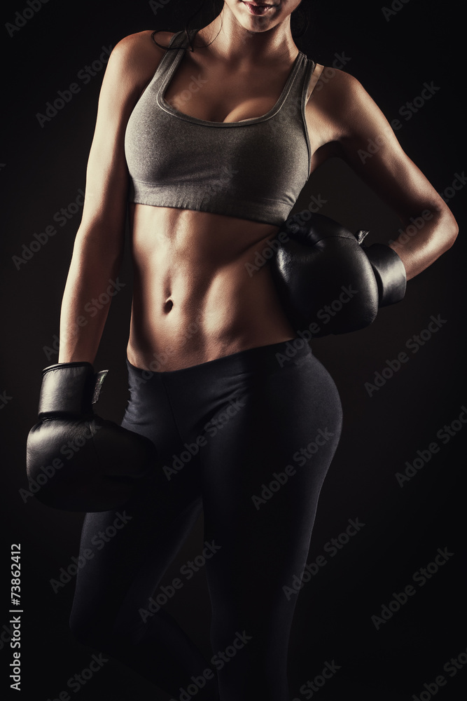Athletic girl ready for fight training