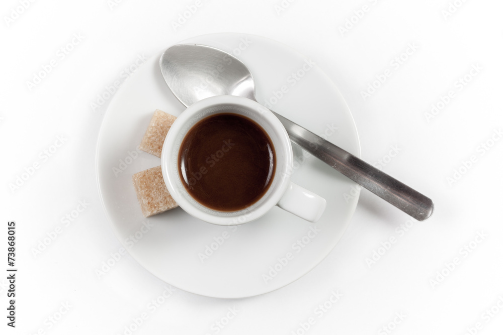 Cup of coffee with spoon isolated on white background, top view Cup of coffee with spoon isolated on white background, top view