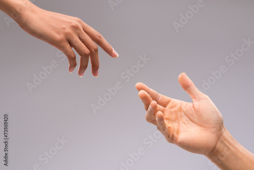 Hands of man and woman