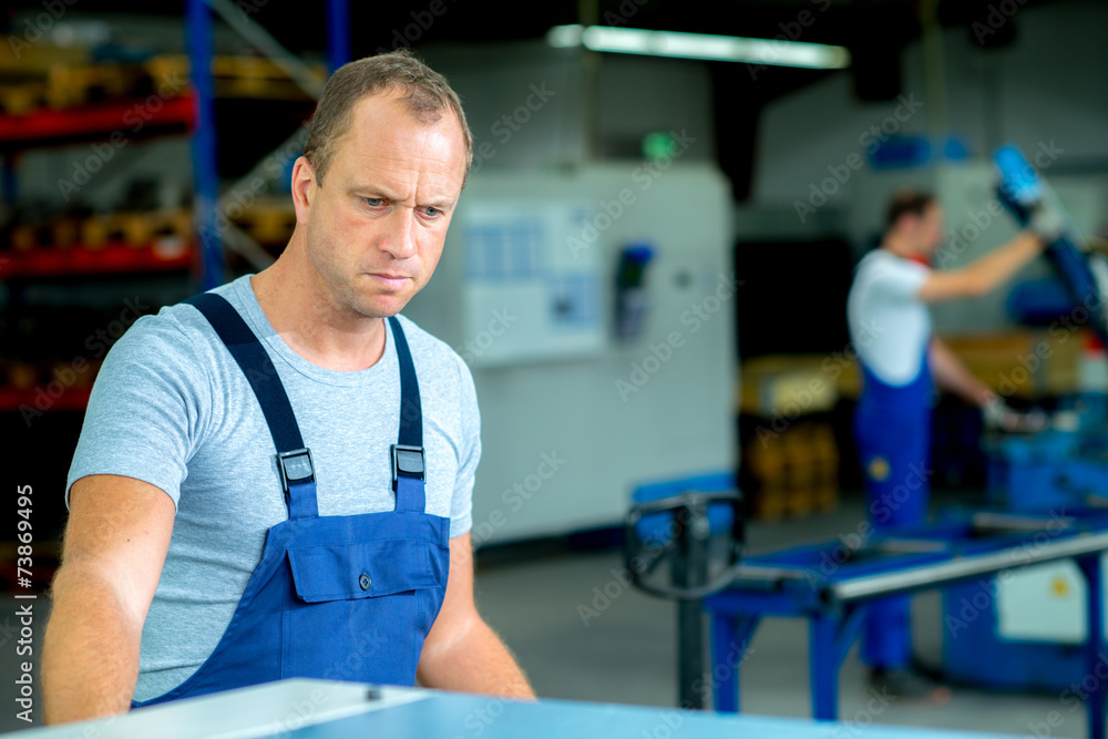 young worker in factory young worker in factory