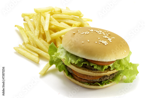 Big hamburger and fried potatoes isolated on white background