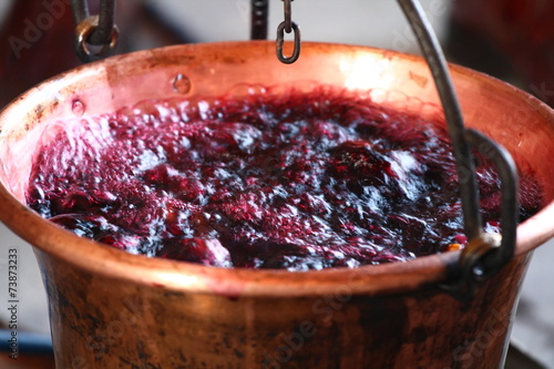 Obraz na plátně huge copper cauldron with the tasty mulled wine cooked over the