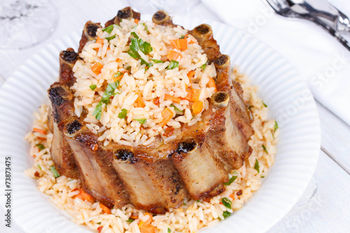 Grilled pork ribs with rice and spices