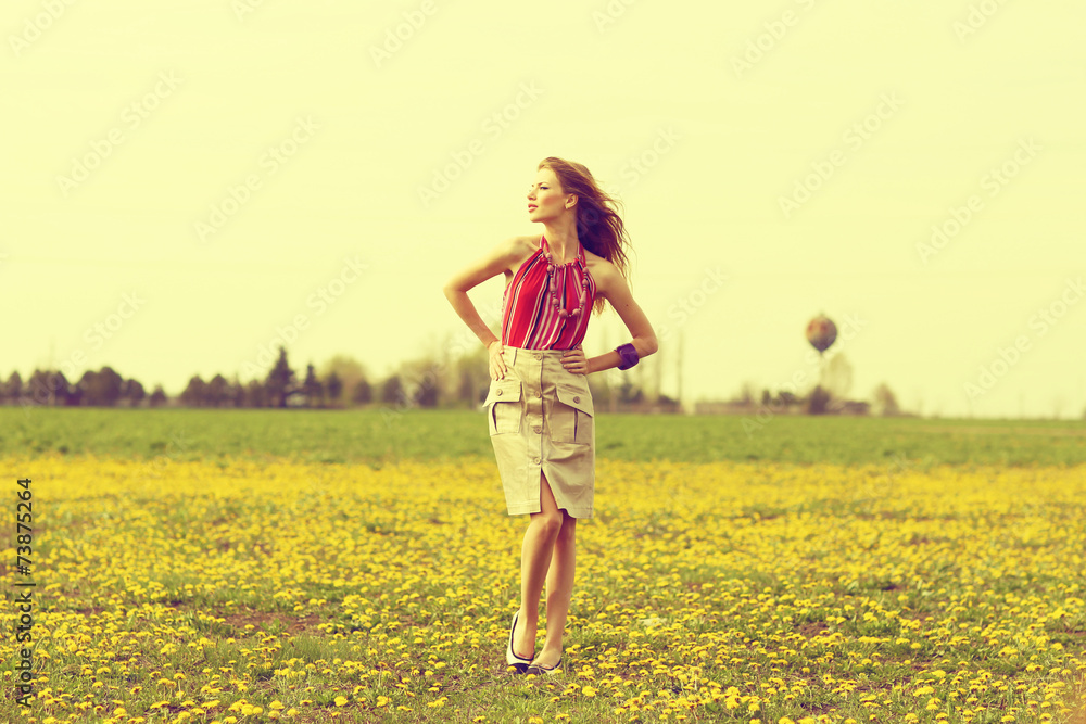 beautiful young girl in a field of flowers beautiful young girl in a field of flowers