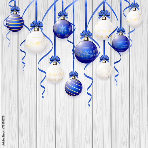 Set of Christmas balls on wooden background