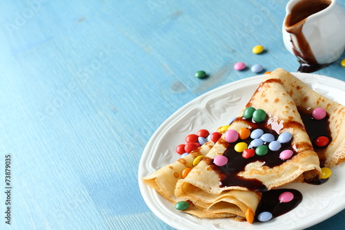 Photography Homemade crepes with multicolored dragee