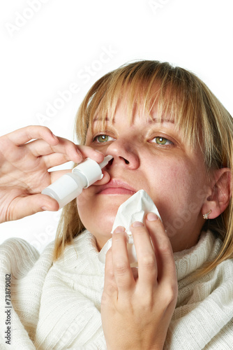 Sick with a rhinitis woman dripping nose medicine isolated