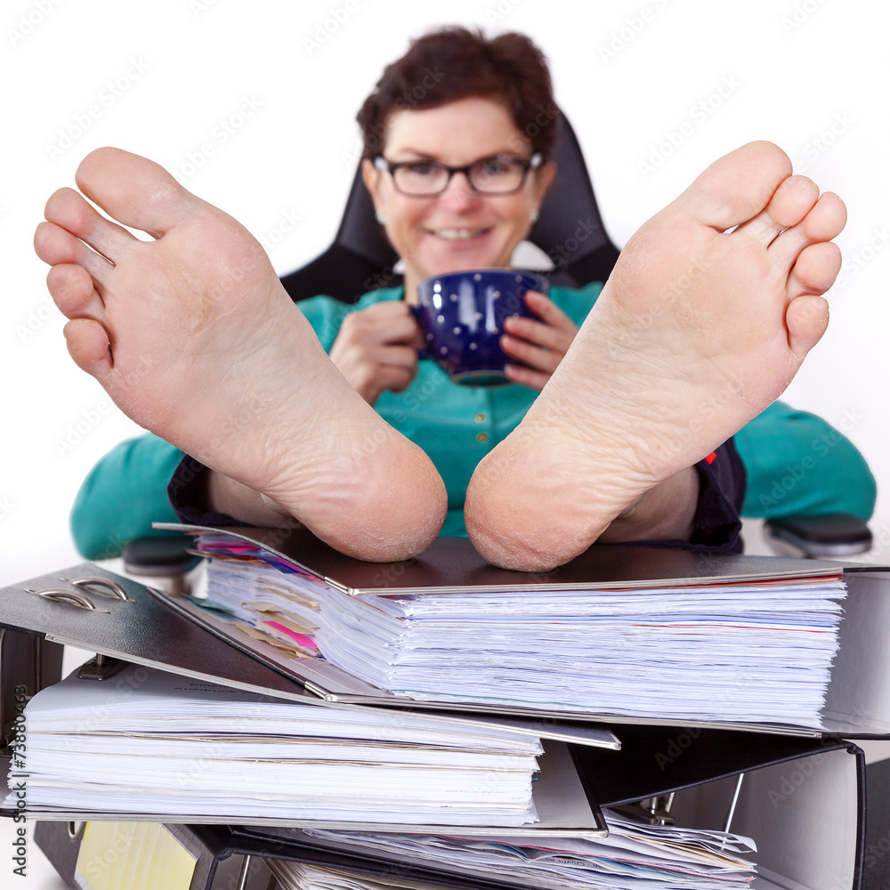Office woman puts feet up relaxing Stock Photo | Adobe Stock