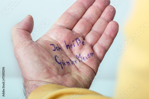 Hand of a dementia with his name