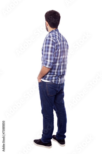 Back view of young casual man, isolated on white background