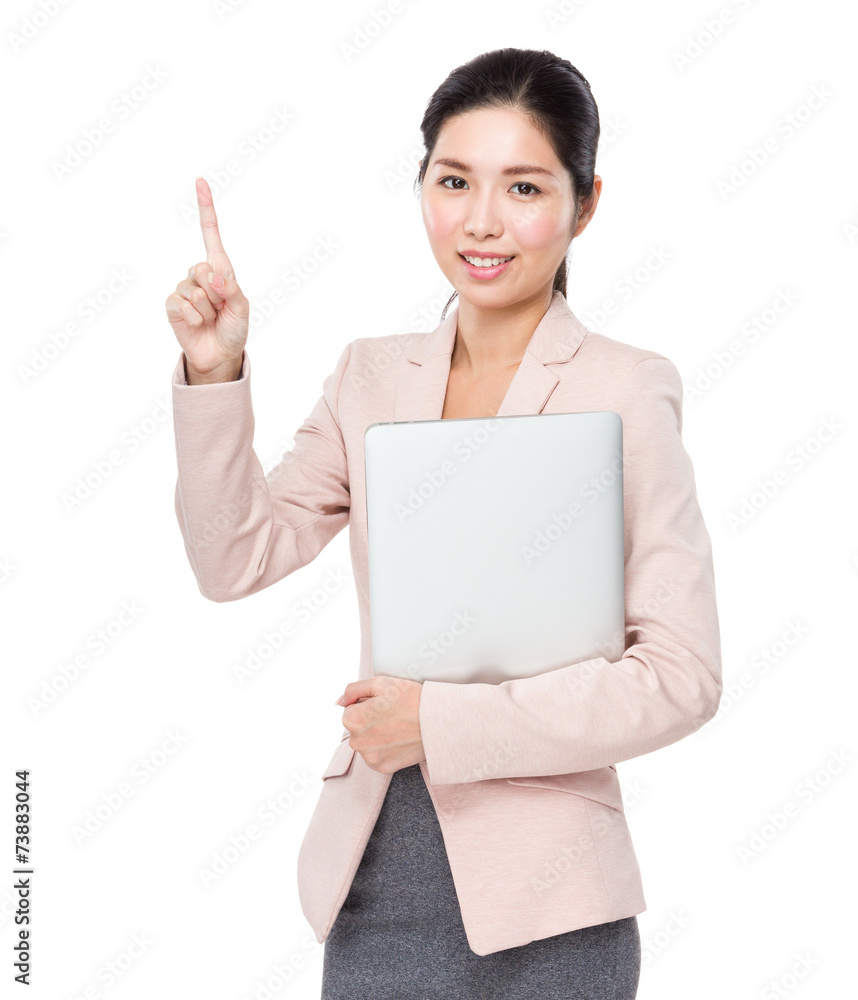 Businesswoman with laptop and finger point up Businesswoman with laptop and finger point up