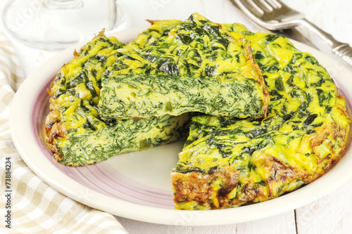Homemade Italian spinach or Swiss chard frittata omelet