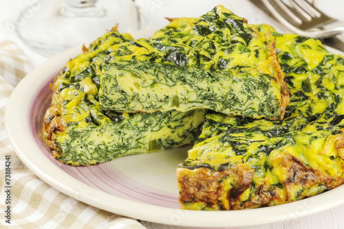 Homemade Italian spinach or Swiss chard frittata omelet