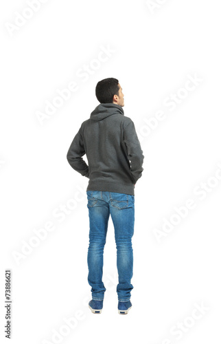 young man, back, full body in a white background