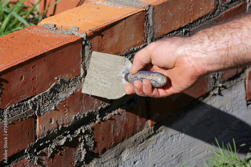 Mauer aus Ziegelsteinen StockFoto Adobe Stock