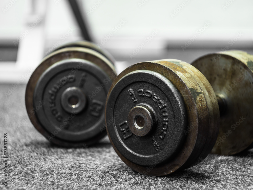 Dumbbells in fitness center Dumbbells in fitness center