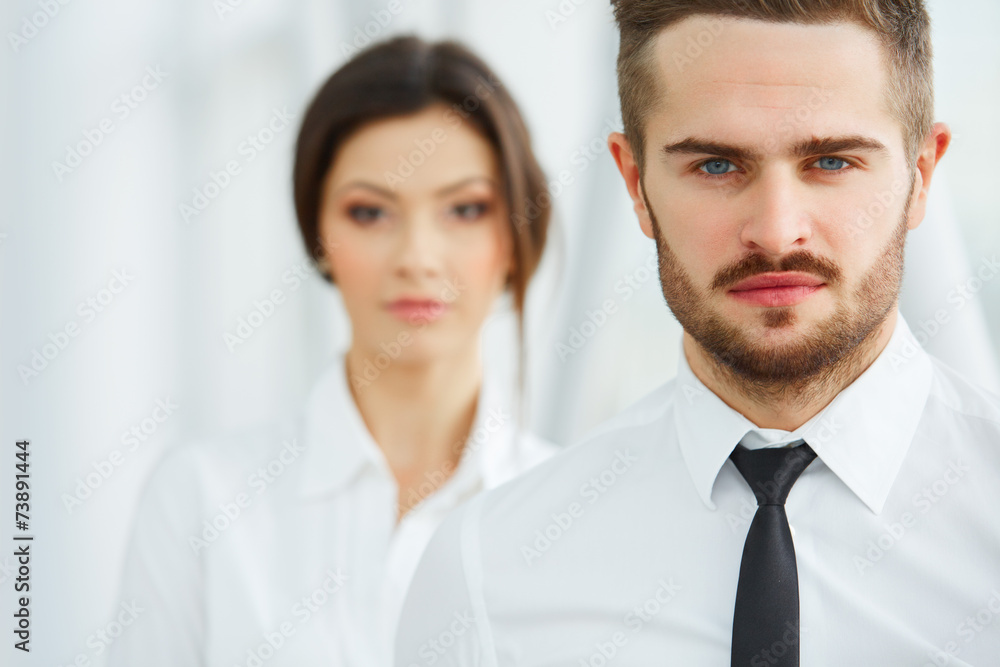 Business Team. Happy smiling people standing in a row at office Business Team. Happy smiling people standing in a row at office