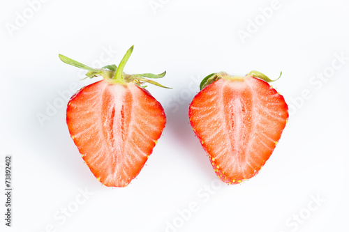 Nice ripe and juicy strawberry cut in half