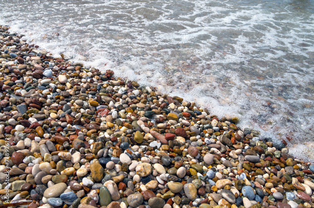 Colored pebbles on the beach Colored pebbles on the beach