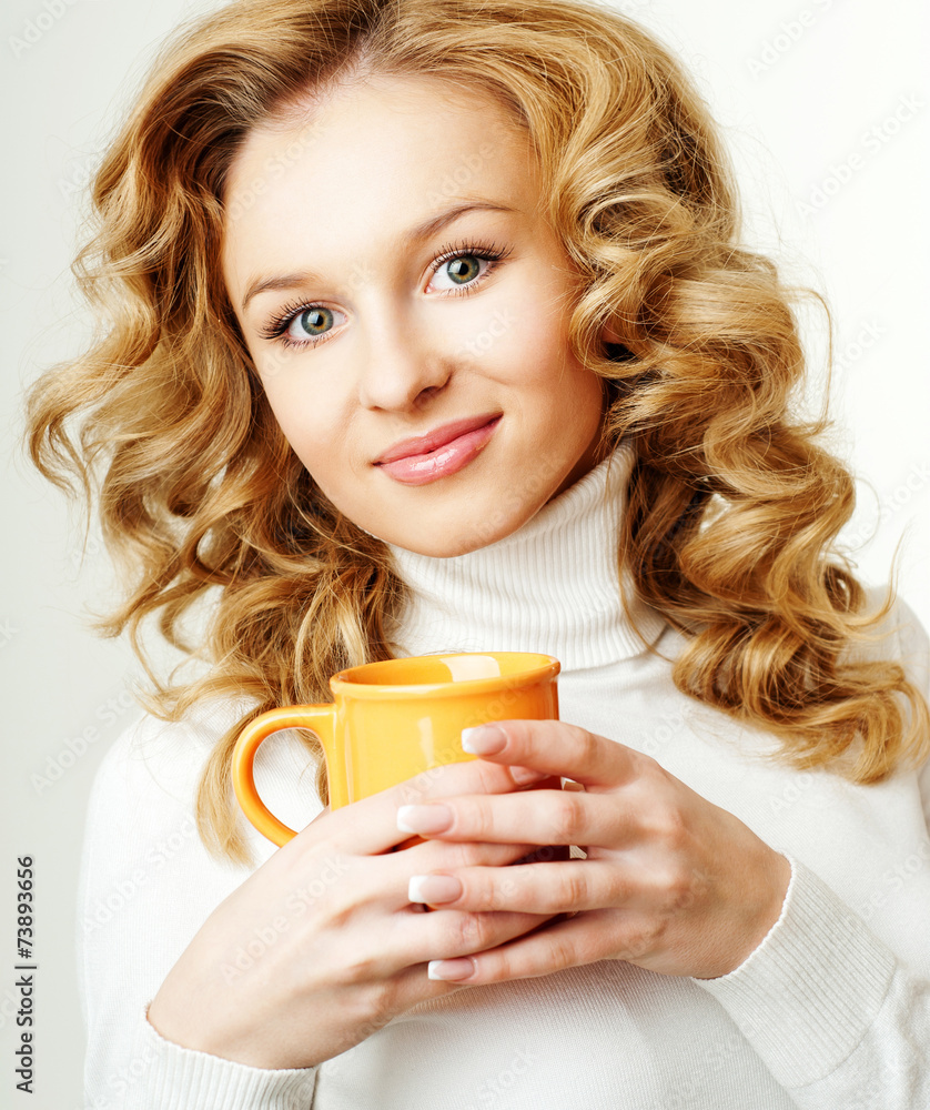 beautiful girl with a cup of tea. the winter season. beautiful girl with a cup of tea. the winter season.