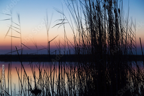 beautiful sunset on the lake © schankz