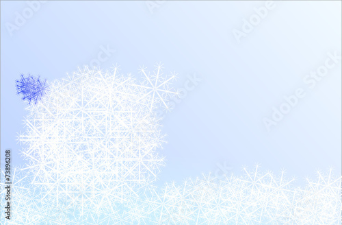 The New Year's toy on snow on blue background