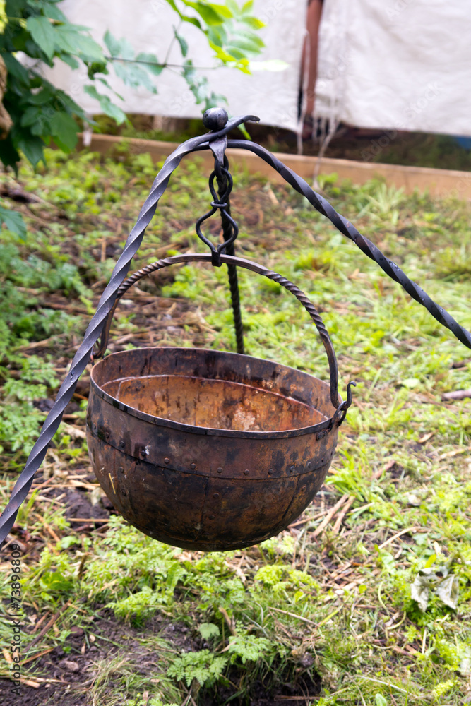 cauldron with a tripod outdoors cauldron with a tripod outdoors